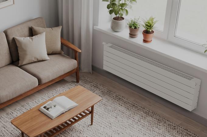 Radiateur Fassane Pack blanc sous une fenêtre