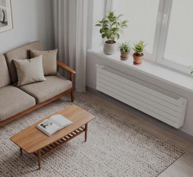 Radiateur Fassane Pack blanc sous une fenêtre